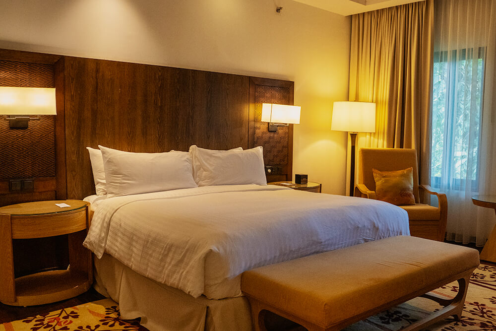 premier suite room at the mulu marriott resort & spa